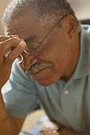 older man with sinus headache