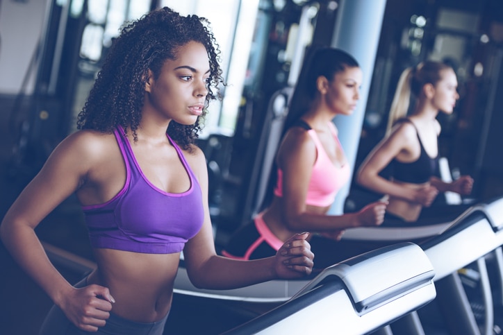 African American woman run treadmill 