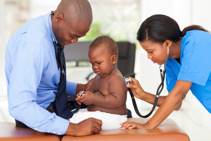 baby with doctors