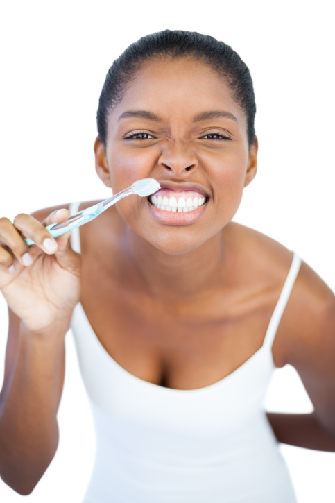 Woman brushing her teeth