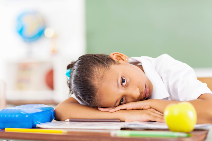primary schoolgirl resting
