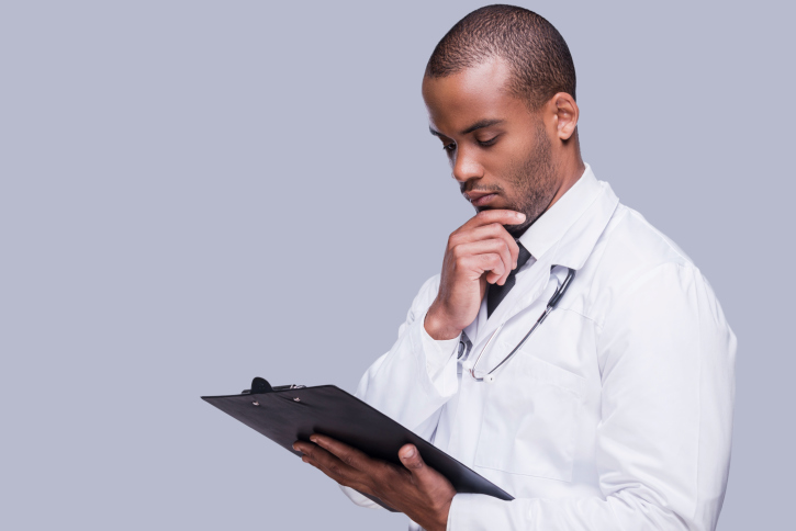 doctor looking at chart