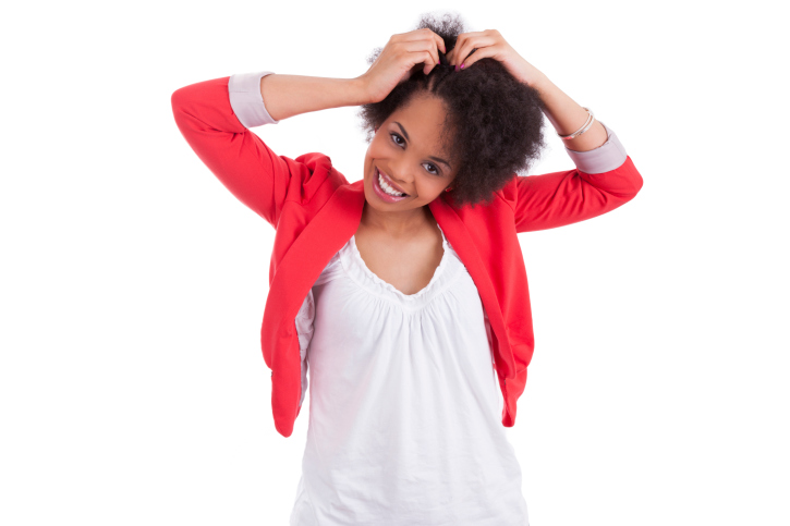 woman braiding hair