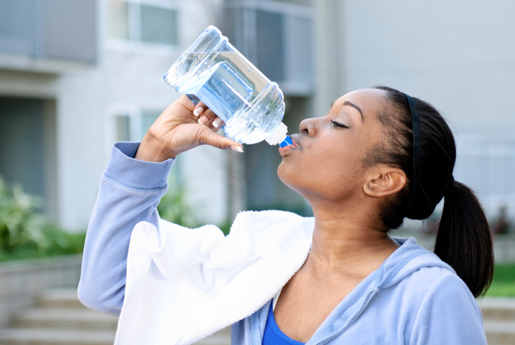 woman drinking gallon of water