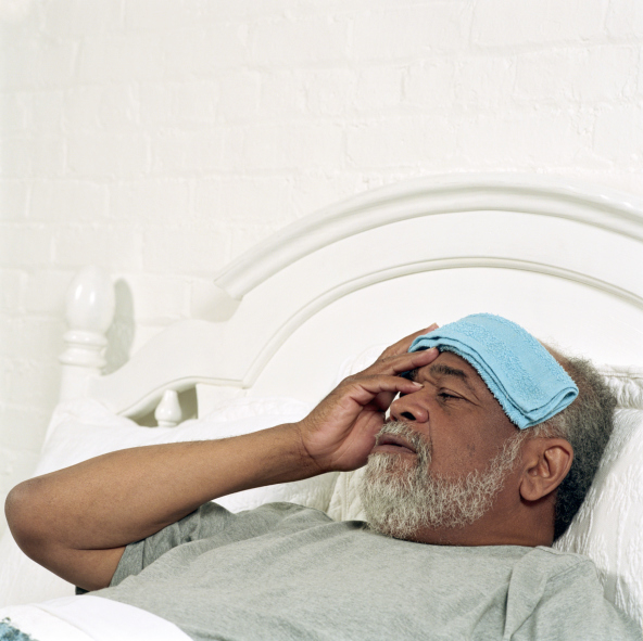 sick man in bed