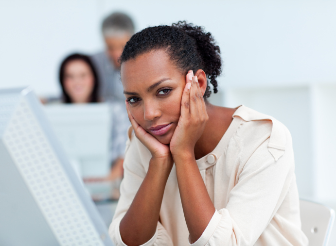 woman looking upset at work