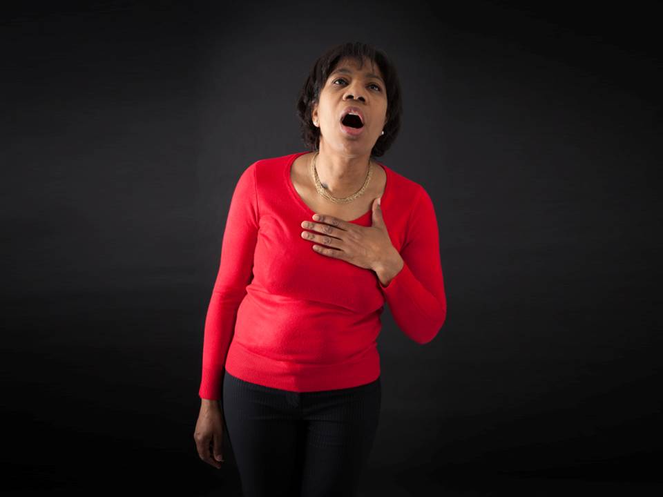 woman holding heart