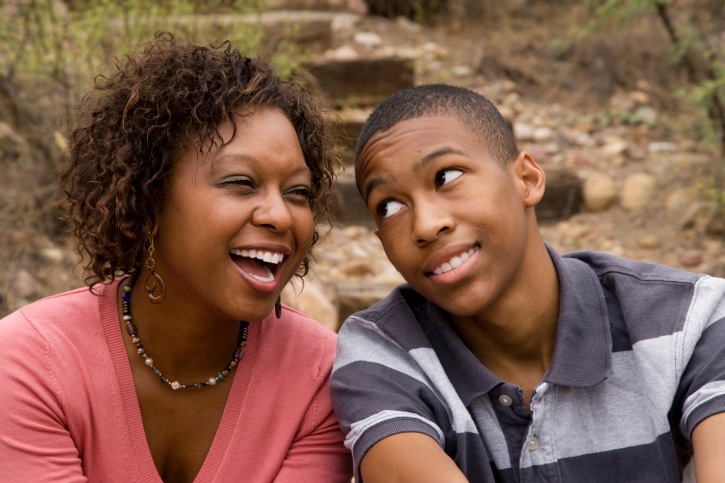 mother and son laughing
