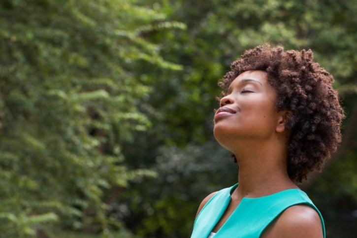 happy African American woman outside