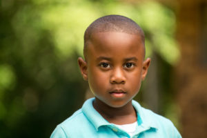 Little boy looking at the camera.