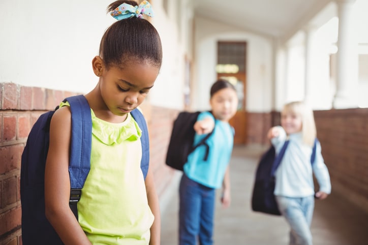 sad African American girl bullied at school