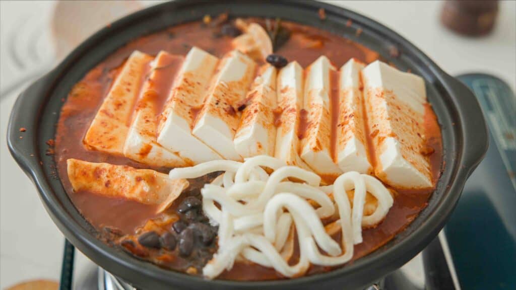 Easy & Hi-Protein Vegan Kimchi Jjigae Reigns Supreme. 10 adding noodles to kimchi jjigae