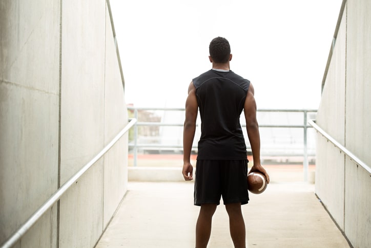 African American teen football player