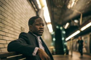 Man waiting on the train. 