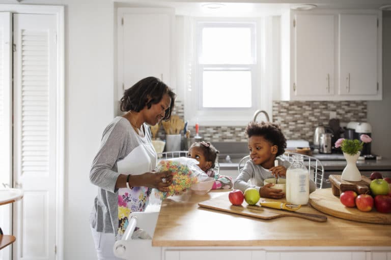 Mother serving breakfast