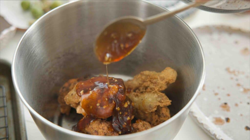 AMAZING Vegan Fried Chicken Recipe (2 Korean Sauces) 14 adding soy glaze to vegan fried chicken