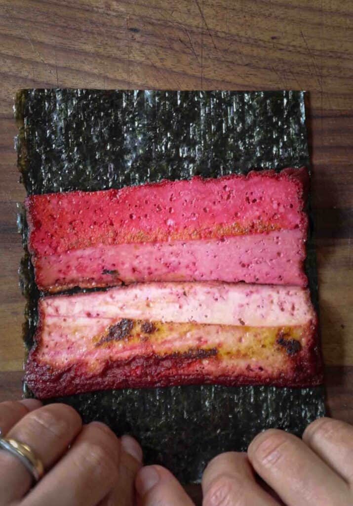 How to Make 4 Stunning Korean Kimbap Recipes. 35 Pink-tofu-half-logs-on-seaweed-sheet