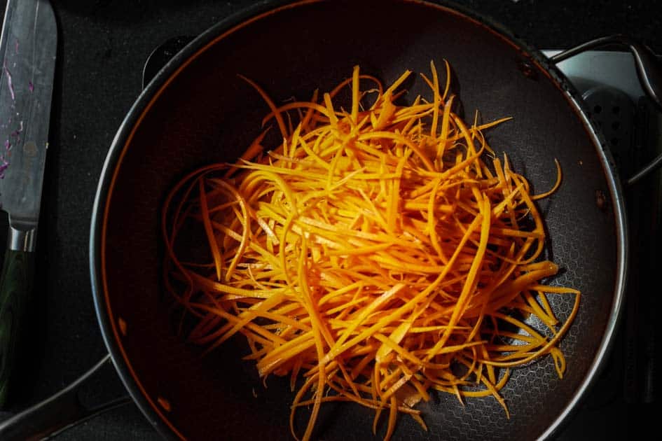 How to Make 4 Stunning Korean Kimbap Recipes. 13 julienned carrots sauteed in a pan