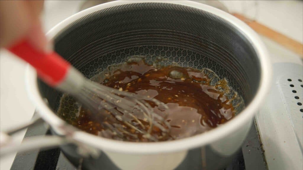 AMAZING Vegan Fried Chicken Recipe (2 Korean Sauces) 13 soy glaze thickening in small pot