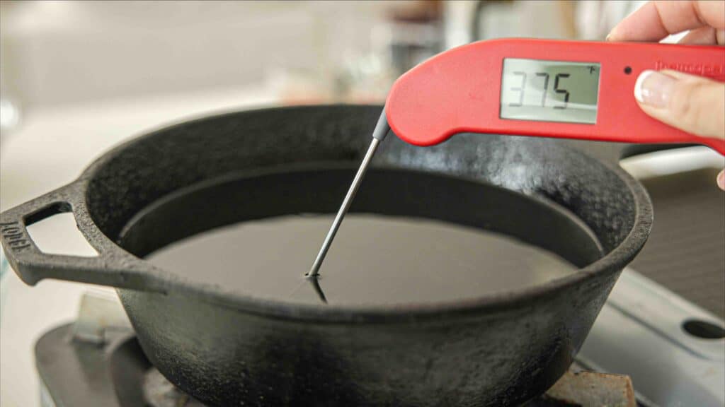 AMAZING Vegan Fried Chicken Recipe (2 Korean Sauces) 10 checking temperature of frying oil with thermometer