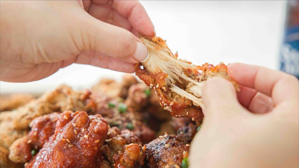 AMAZING Vegan Fried Chicken Recipe (2 Korean Sauces) 16 close up shot of vegan fried chicken being pulled apart