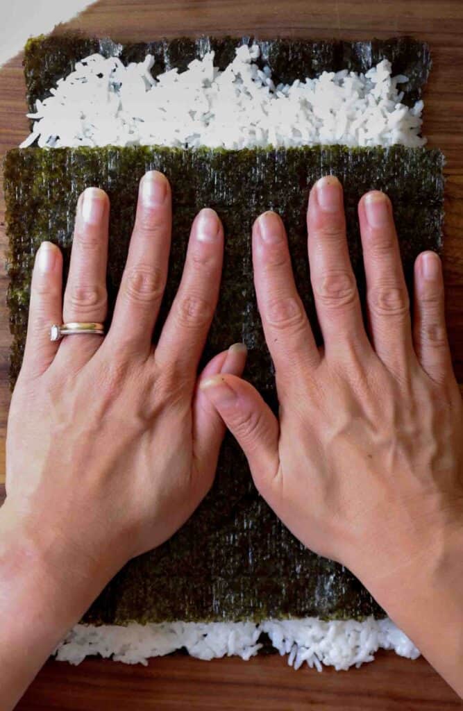How to Make 4 Stunning Korean Kimbap Recipes. 27 placing-second-sheet-of-seaweed-over-top-of-rice