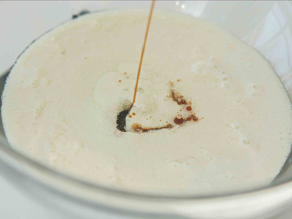 The Perfect NO BAKE Easy Vegan Sponge Cake Recipe. 10 adding vanilla extract to wet ingredients