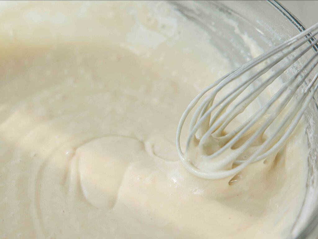 The Perfect NO BAKE Easy Vegan Sponge Cake Recipe. 11 silky smooth cake batter
