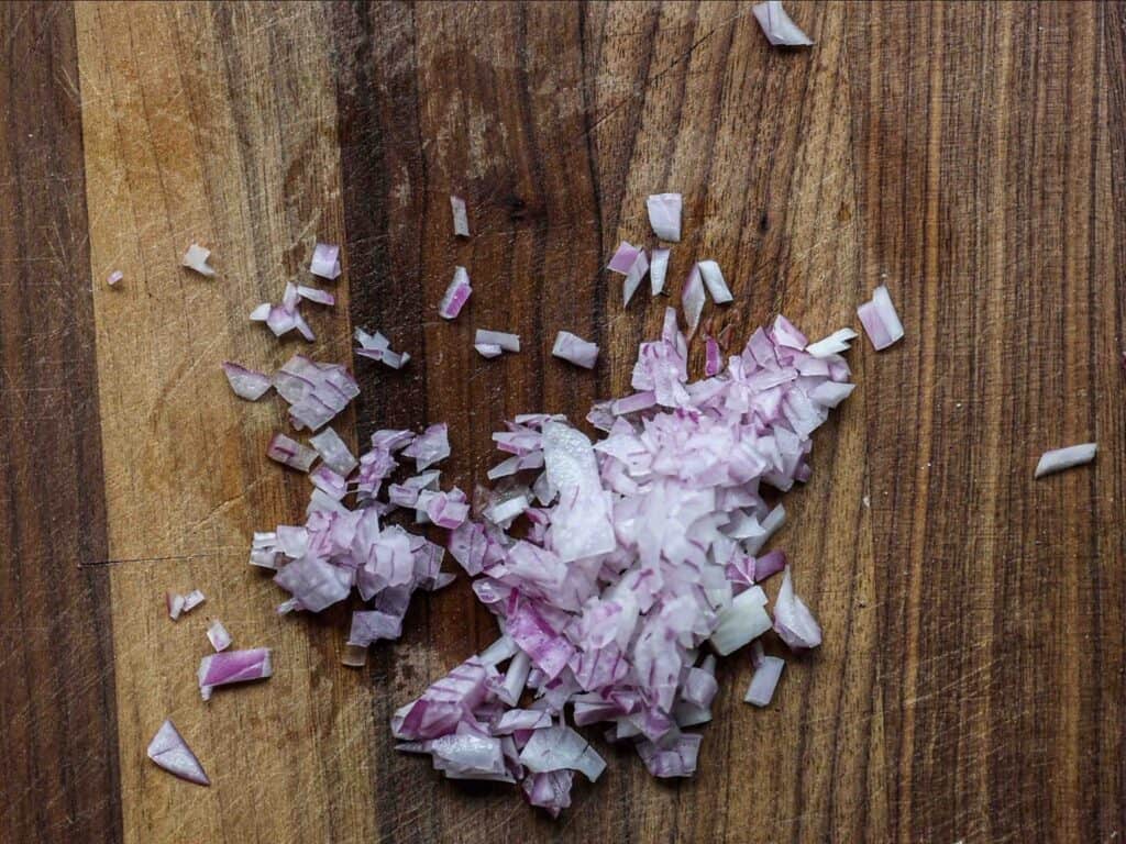 15-Minute Spicy & Cold Bibim Kimchi Noodles Recipe. 7 chopped-red-onion