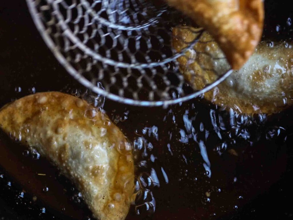 Homemade Vegan Dumplings Recipe - Kimchi Mandu. 33 deep-frying-dumplings