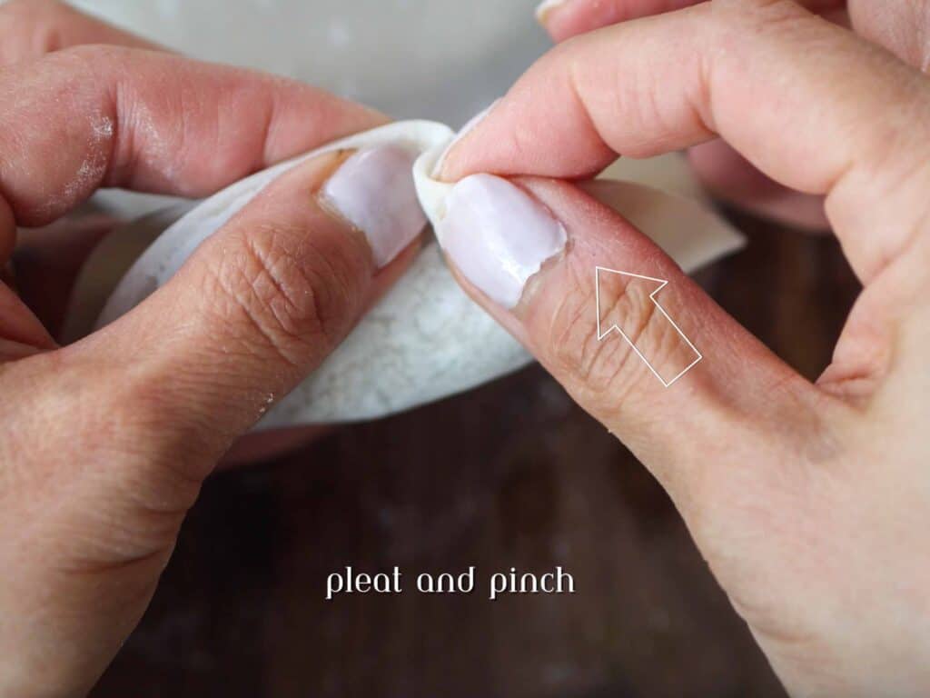 Homemade Vegan Dumplings Recipe - Kimchi Mandu. 28 first-pleat-of-pleat-and-pinch-dumpling-shape