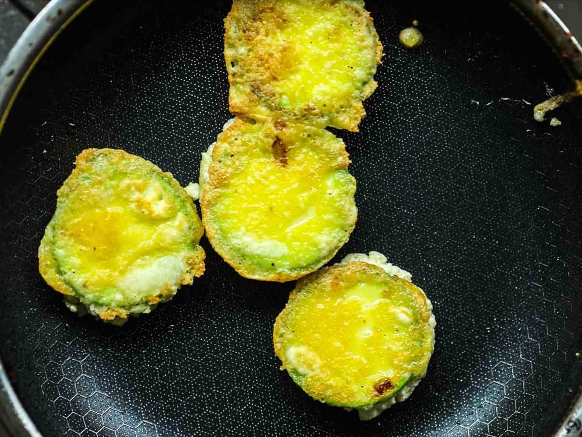 My Mom's Easy Vegetarian Japchae (Glass Noodles). 32 flipped-zucchini-fritters-in-pan-