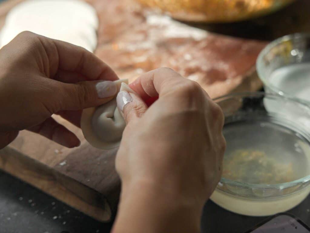 Homemade Vegan Dumplings Recipe - Kimchi Mandu. 16 folding-dumpling