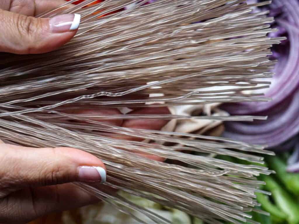 Healthy And Easy Vegan Japchae (Korean Glass Noodles). 4 raw korean glass noodles