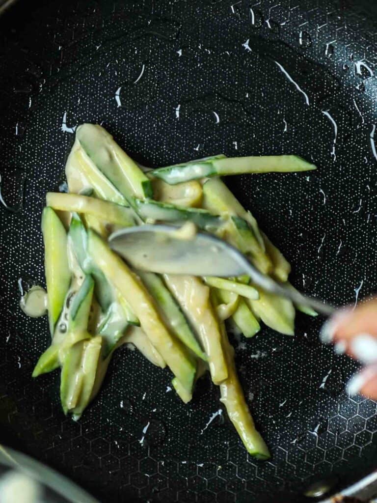 5 Easy Korean Zucchini Recipes (Banchan Side Dishes). 20 spooning-zucchini-pancake-batter-onto-pan
