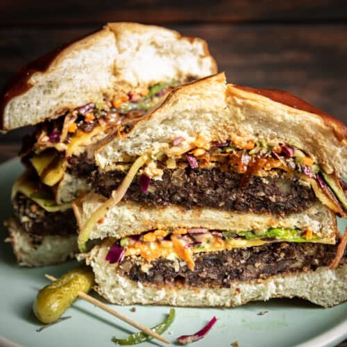 Best EVER Black Bean Burger with Slaw. 4 sliced up black bean burger