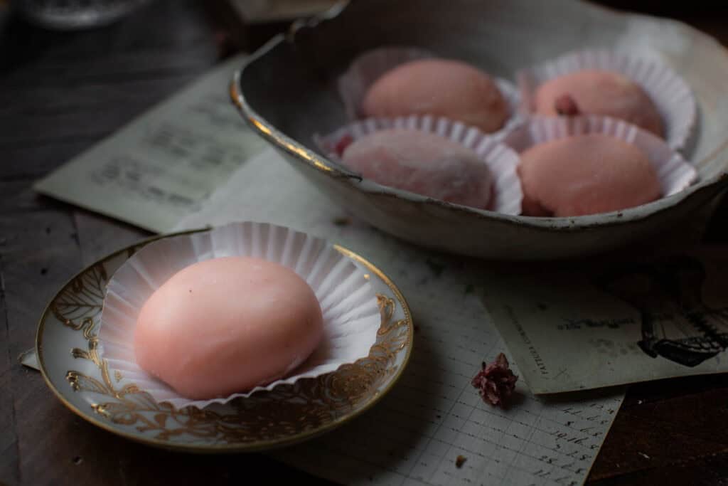 Perfect Cream Cheese & Strawberry Pink Mochi Recipe. 2 One-main-pink-mochi-in-small-plate-with-others-behind