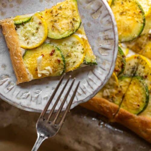 30-Minute Easy Cream Cheese Zucchini Tart (Vegan). 22 close up shot of piece of zucchini tart with fork