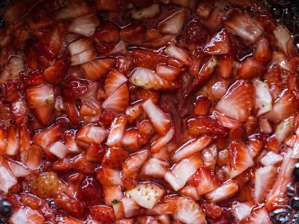 Perfect Cream Cheese & Strawberry Pink Mochi Recipe. 8 cooking-strawberries-in-pot