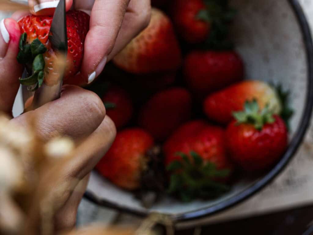 Perfect Cream Cheese & Strawberry Pink Mochi Recipe. 7 cutting-fresh-strawberries-for-jam-for-pink-mochi