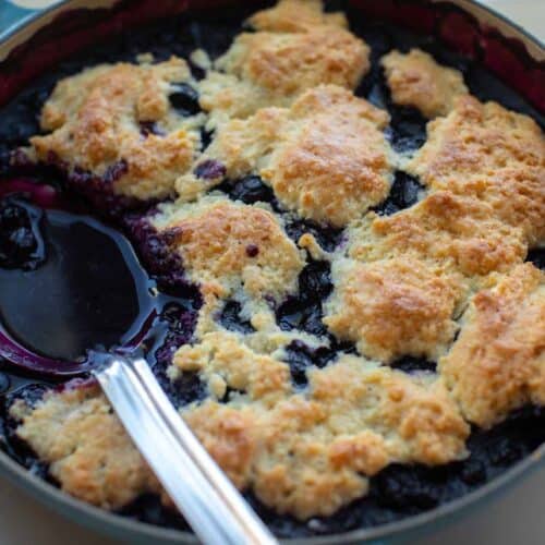 Easy Vegan Blueberry Cobbler (Gluten-Free Option!) 25 hero image of vegan blueberry cobbler in pan