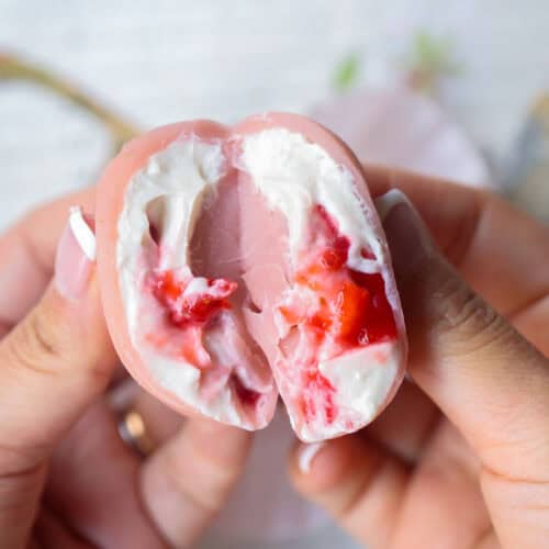 Perfect Cream Cheese & Strawberry Pink Mochi Recipe. 31 pink-mochi-cut-in-half-to-reveal-filling