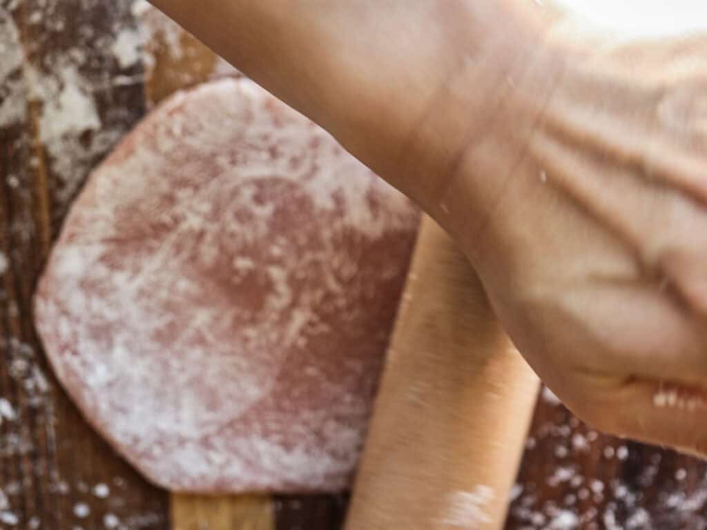 Perfect Cream Cheese & Strawberry Pink Mochi Recipe. 22 rolling-pink-mochi-dough-with-mini-rolling-pin