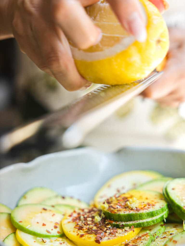 30-Minute Easy Cream Cheese Zucchini Tart (Vegan). 13 zesting-lemon-over-squash-rounds