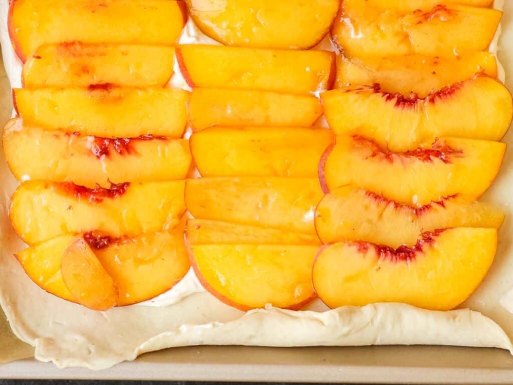 6-Ingredient Easy Cream Cheese Peach Galette Recipe. 17 bottom-half-of-unbaked-peach-galette