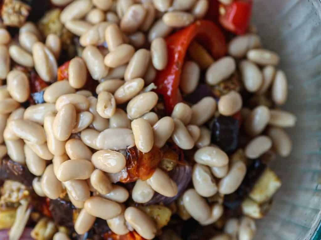DELICIOUS Hi-Protein Vegan Mediterranean Toast Recipe. 8 close-up-of-cannellini-beans-and-roasted-vegetables
