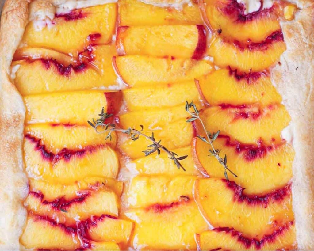 6-Ingredient Easy Cream Cheese Peach Galette Recipe. 3 close-up-shot-of-baked-peach-galette