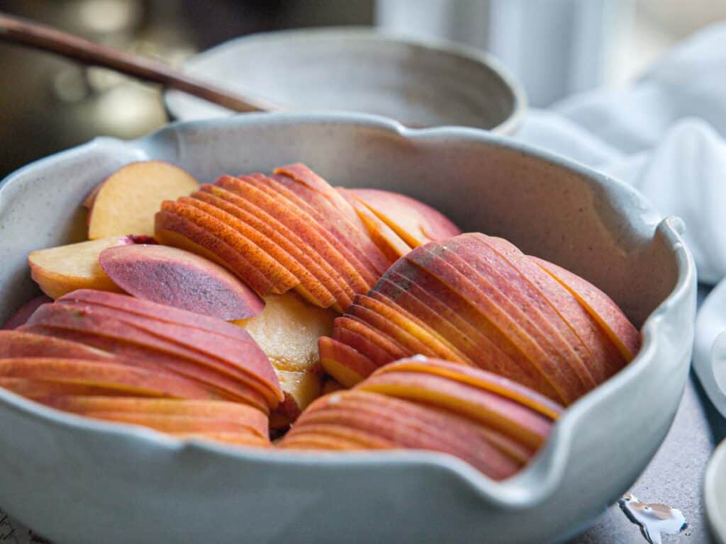 6-Ingredient Easy Cream Cheese Peach Galette Recipe. 5 close-up-shot-of-peach-slices-for-peach-galette