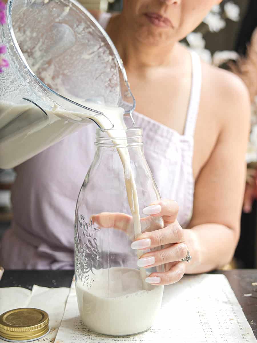Easy and Authentic Cold Kong Guksu Recipe (Vegan). 9 pouring-soy-milk-into-bottle