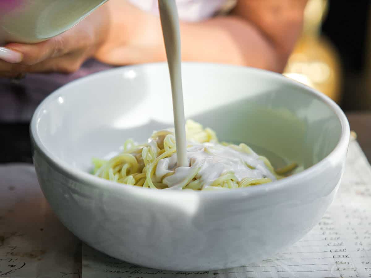 Easy and Authentic Cold Kong Guksu Recipe (Vegan). 15 pouring-soy-milk-over-noodles